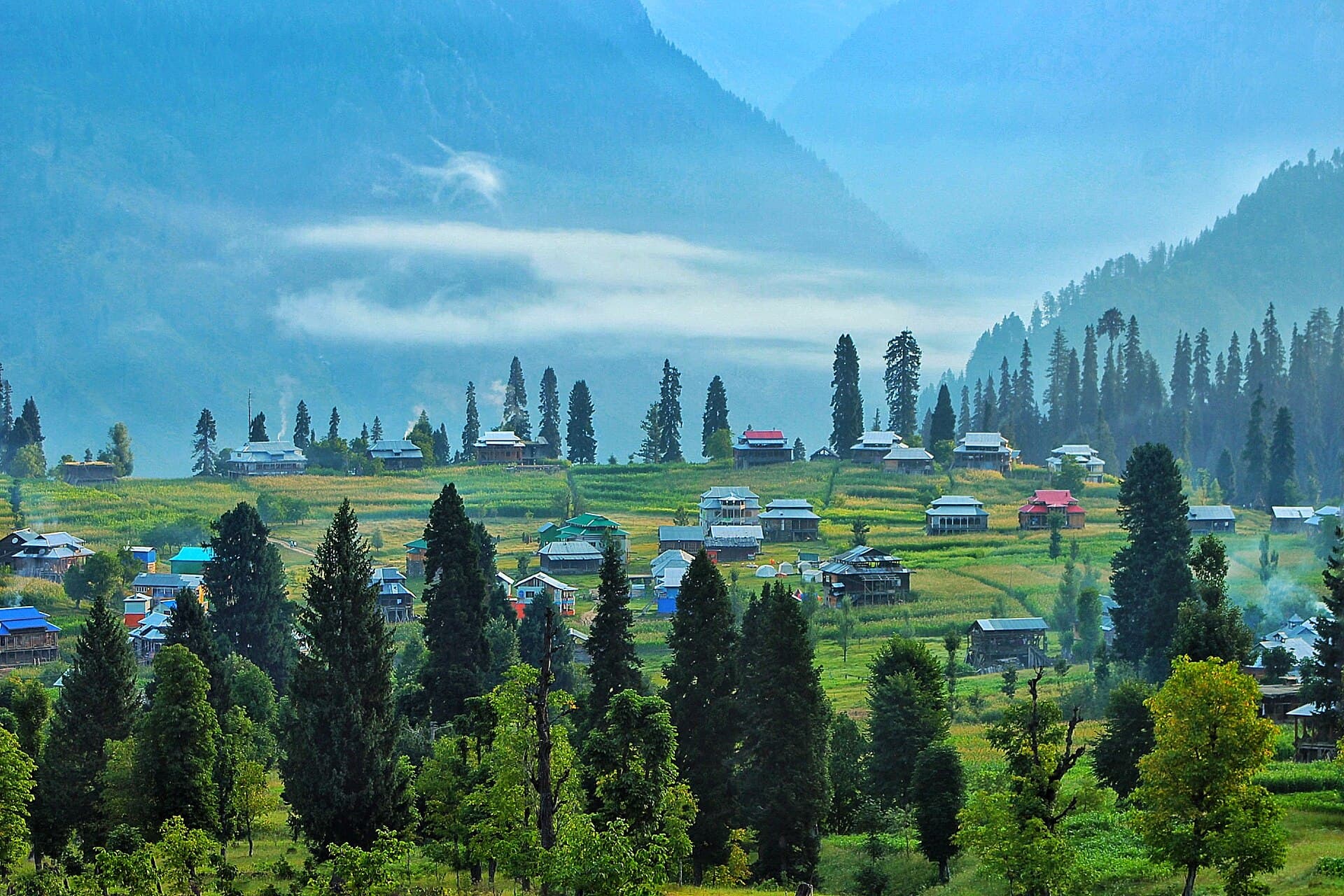 The village on its shelf above the river, seen from the climb up.