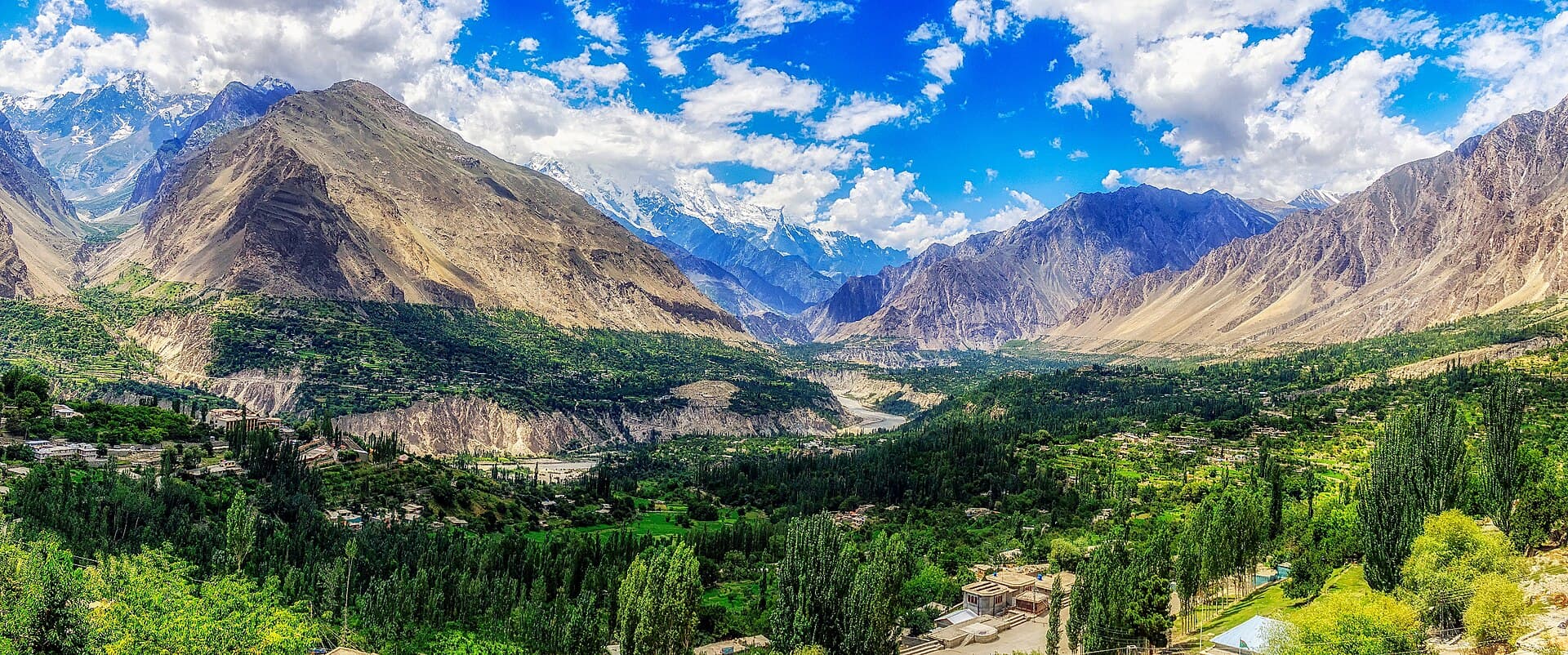 Terraced fields in Hunza Valley with snow-capped peaks